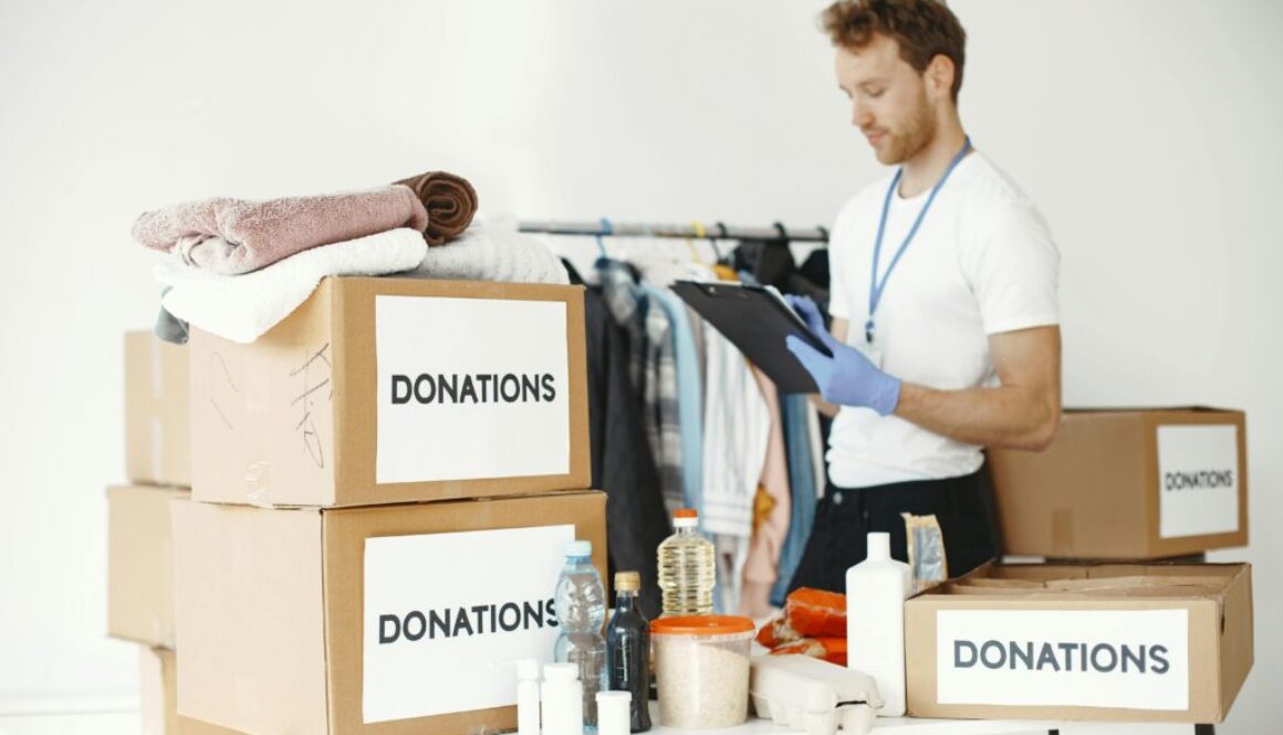 Recycling and donation Pueblo – people donating clothes, books, and household items to support eco-friendly junk removal and local charities