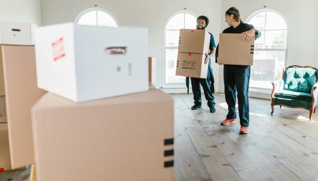 Junk removal Colorado Springs – professional team removing boxes and furniture efficiently for busy homeowners to reclaim living and work spaces
