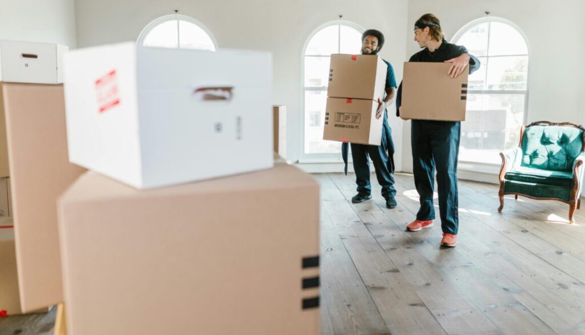 Junk removal Colorado Springs – professional team removing boxes and furniture efficiently for busy homeowners to reclaim living and work spaces