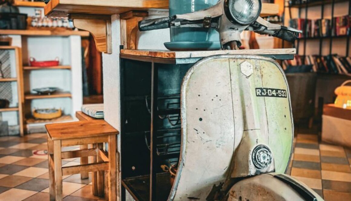 Repurpose old items Colorado Springs – old scooter turned into a functional shelf as a creative and eco-friendly DIY project