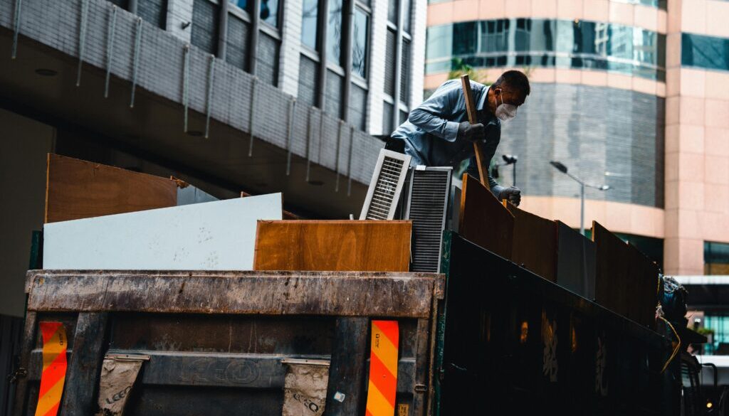 Construction debris removal Pueblo – professional crew clearing renovation waste such as wood, drywall, and tiles safely and efficiently
