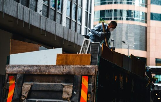 Construction debris removal Pueblo – professional crew clearing renovation waste such as wood, drywall, and tiles safely and efficiently